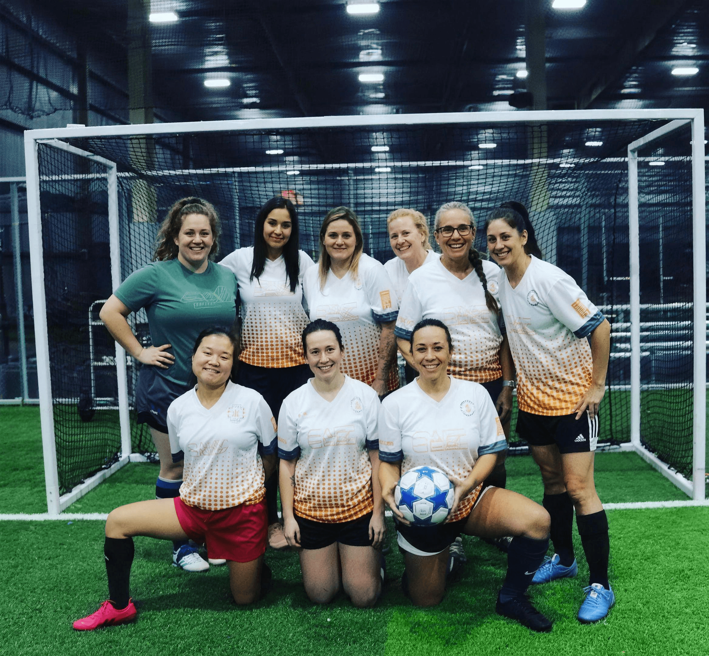 Women's indoor soccer team in custom kit by Zees Commerce