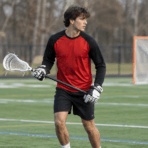 Custom Lacrosse Shooter Shirt – Red & Black - on model - Zees Commerce