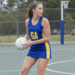 Custom Netball Dress – Royal Blue & Yellow - on model - Zees Commerce